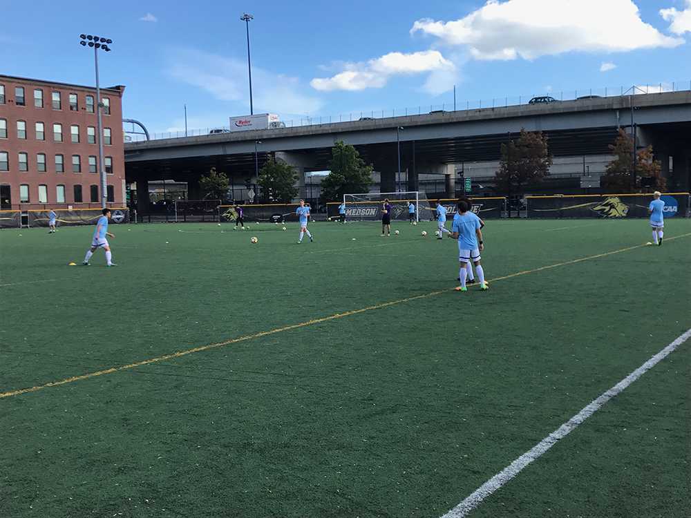 Emerson+and+MIT+players+donned+blue+warmups+as+part+of+their+effort+to+raise+funds+for+Soccer+Without+Borders+at+their+game+on+Saturday.%0AKYLE+BRAY+%2F+BEACON+STAFF