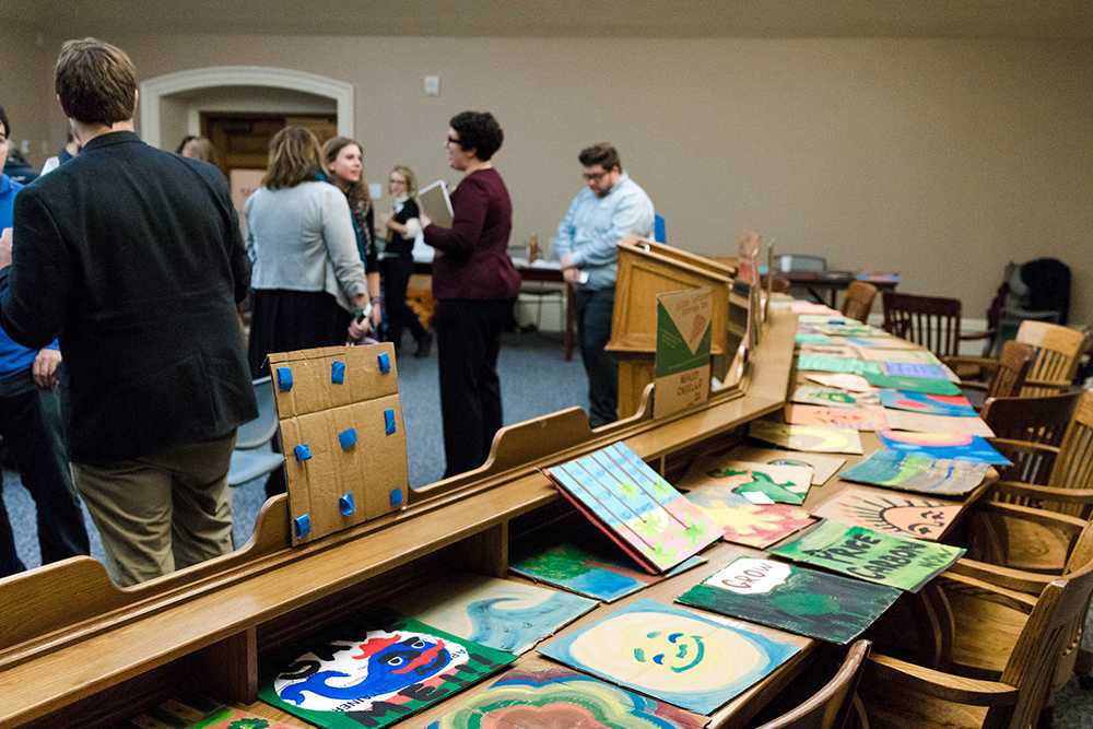 The cardboard mosaic will be installed in the State House from Jan. 29 to Feb. 2. Photo: Justin Scott Johnson / Beacon Staff