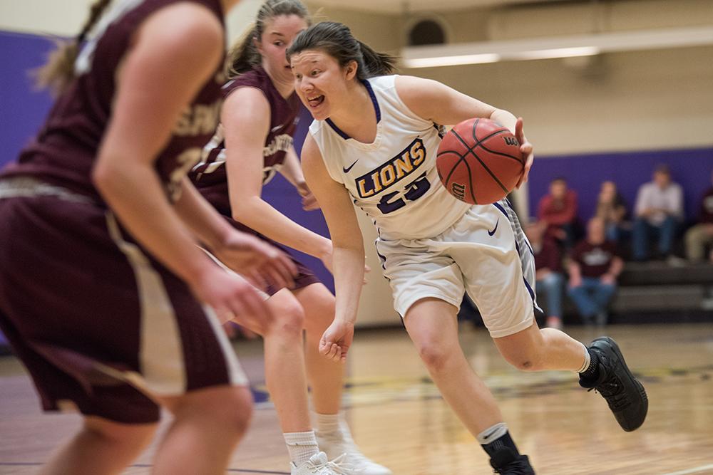 Emersons Ashley Toner drives to the basket against Springfield. 