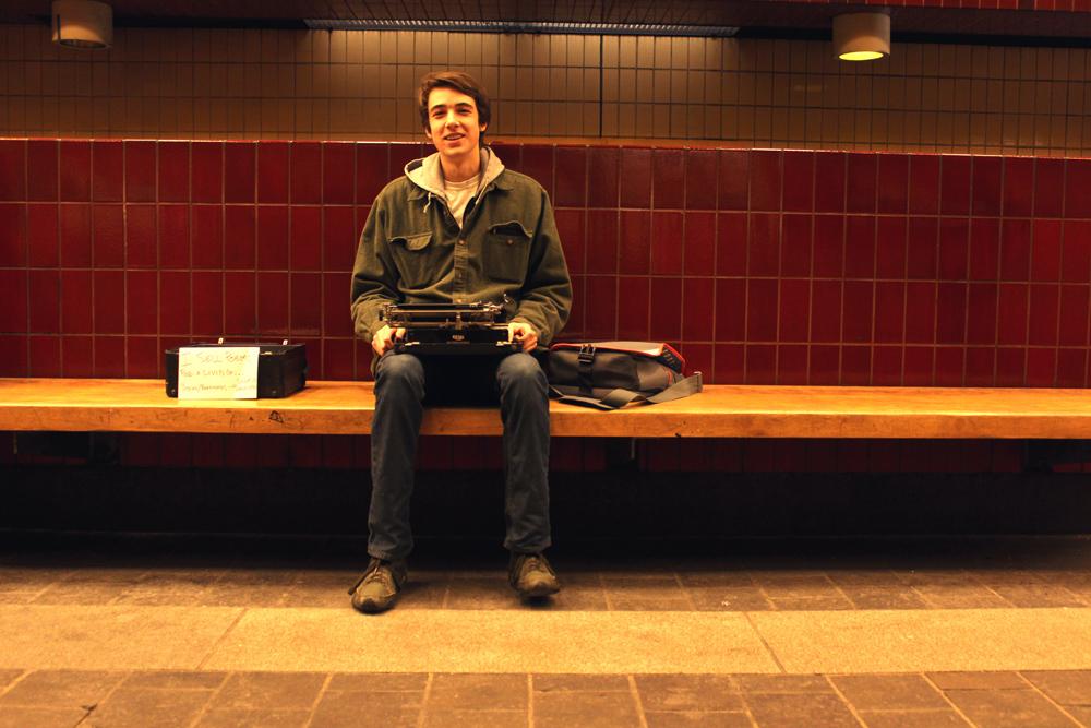Busker+sells+hand-typed+poems+in+Harvard+Square+T+stop