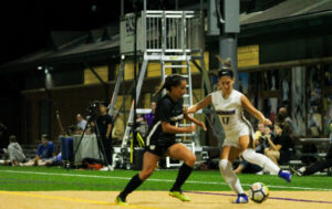 Freshman Marie Bou Aziz (right, No. 17) scored her second and third collegiate goals in the team's win against Wentworth. Rachel Culver / Beacon Staff