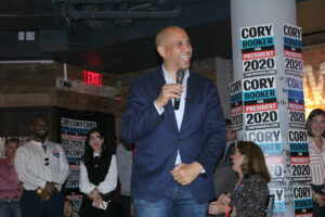 Booker talks gun control, student debt at Fenway campaign event