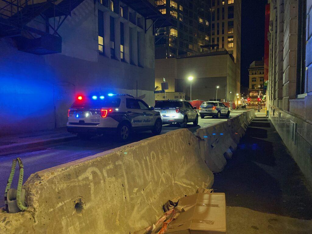 Four Boston police cars at Langrange and Tremont St. at approximately 6 p.m. Sam Doran / Beacon Correspondent