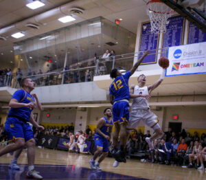 Men’s basketball dominates in home opener