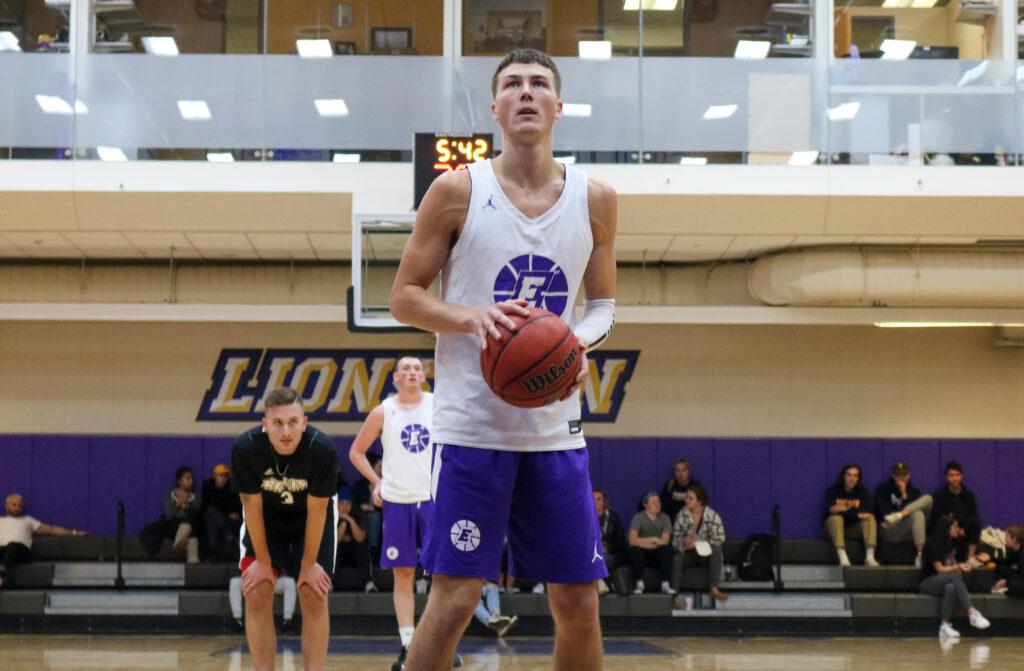Senior Jack OConnor scored 17 points with 40 percent shooting from the field in the Lions scrimmage against Regis College. Aaron J. Miller / Beacon Staff