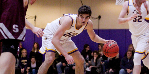 Men’s basketball upsets nationally-ranked team in NEWMAC playoff rematch