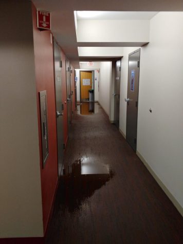Broken sprinkler causes flooding in Piano Row