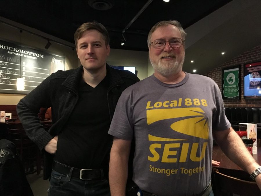 Christopher Wilson (left) and Dennis Levine (right) wait at Rock Bottom restaurant for prospective staff union members to arrive. Photo credit: Dana Gerber