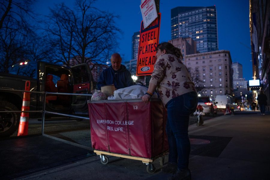 A student moving out of their dorm building.