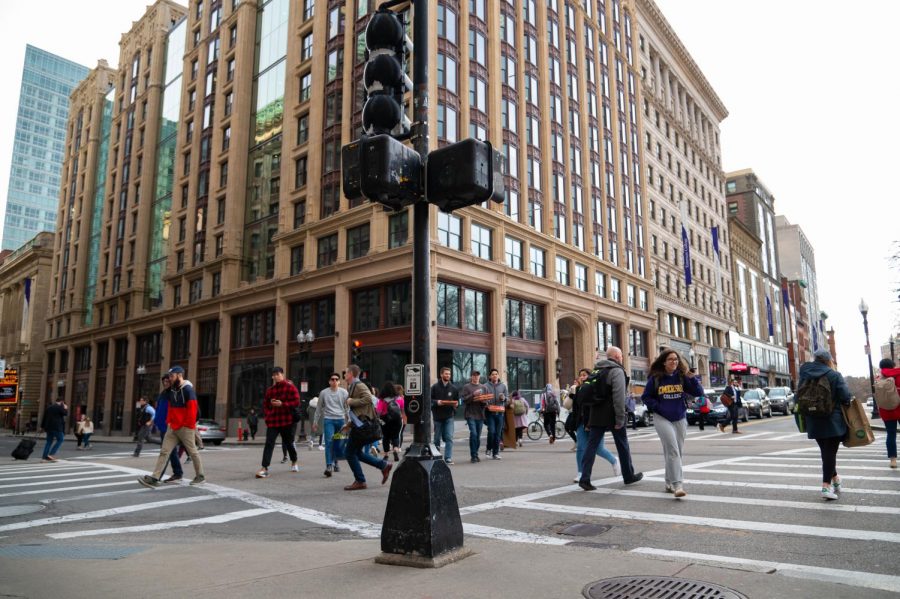 Students cross the intersection of Boylston St. and Tremont St.