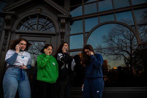 Freshman students left to right: Carrie Aubin, Chloe Shaar, Eva Charbonnnier, and Isabella Espejo, calling their parents to let them know of the college's decision asking them to leave campus by March 20, 2020.