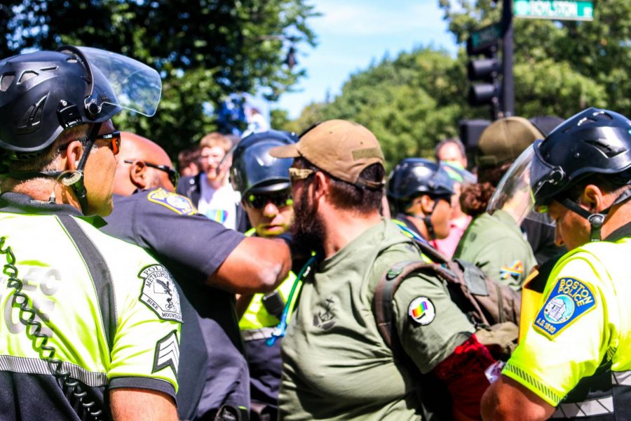 A protestor is arrested during last August's Straight Pride Parade. The group that organized the parade, Super Happy Fun America, is set to clash with counter-protestors Saturday afternoon at a pro-police rally.
