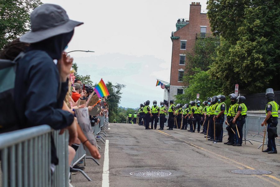 The protesters and counter protesters were separated by barriers on either side of Beacon Street and lines of police officers. 