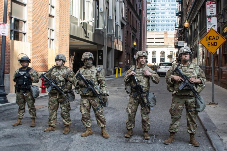 Four members of the National Guard and one member of the Military Police stood guard at the edge of Wednesday's protests. 