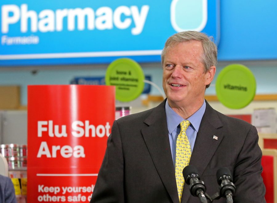 Gov. Charlie Baker speaks to the media after receiving a flu shot at a CVS in Roslindale on September 17, 2020 in Boston, MA.