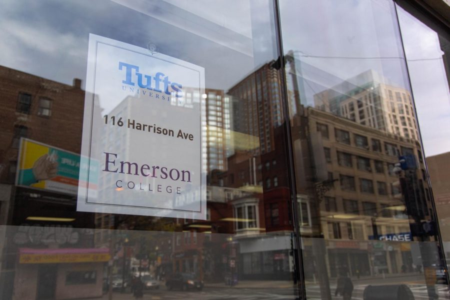 A sign on the window of Emerson's coronavirus testing site at Tufts Medical Center.