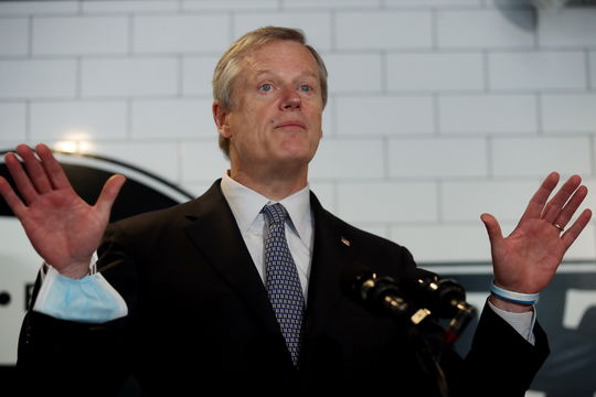 Governor Charlie Baker takes questions from the media at Mill City BBQ and Brew in Lowell, MA, September 23, 2020.