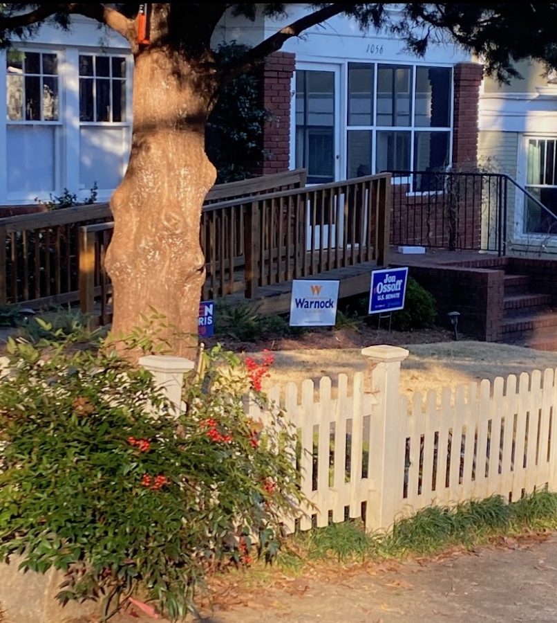 A+Georgia+lawn+with+signs+for+Democratic+candidates+Jon+Ossoff+and+Raphael+Warnock%2C+both+running+in+Georgias+two+runoff+Senate+races.+