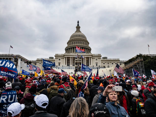 WASHINGTON, DC - JANUARY 06: Pro-Trump supporters storm the U.S. Capitol following a rally with President Donald Trump on January 6, 2021 in Washington, DC. Trump supporters gathered in the nations capital today to protest the ratification of President-elect Joe Bidens Electoral College victory over President Trump in the 2020 election. (Photo by Samuel Corum/Getty Images)