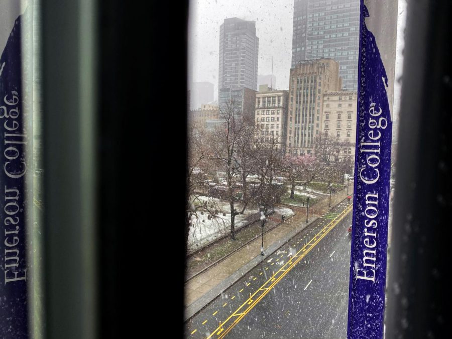 The view of Boylston Street from a Piano Row dorm room as it snows. 