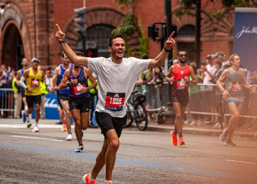 Runners+cross+the+Boston+Marathons+finish+line+at+Copley+Square.