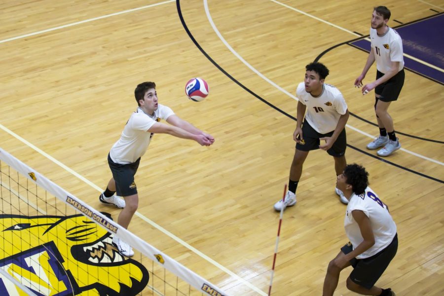 Emerson mens volleyball team setting up an attack.