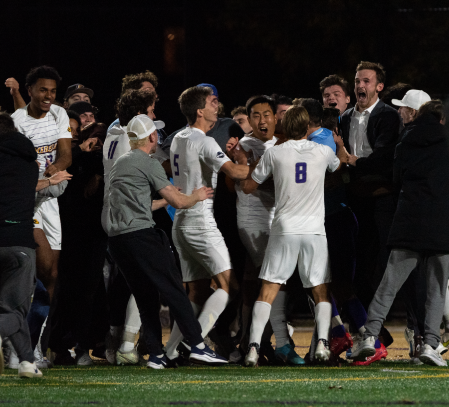 The mens soccer team embracing after a hard-fought penalty shootout win against MIT in the NEWMAC semifinals.