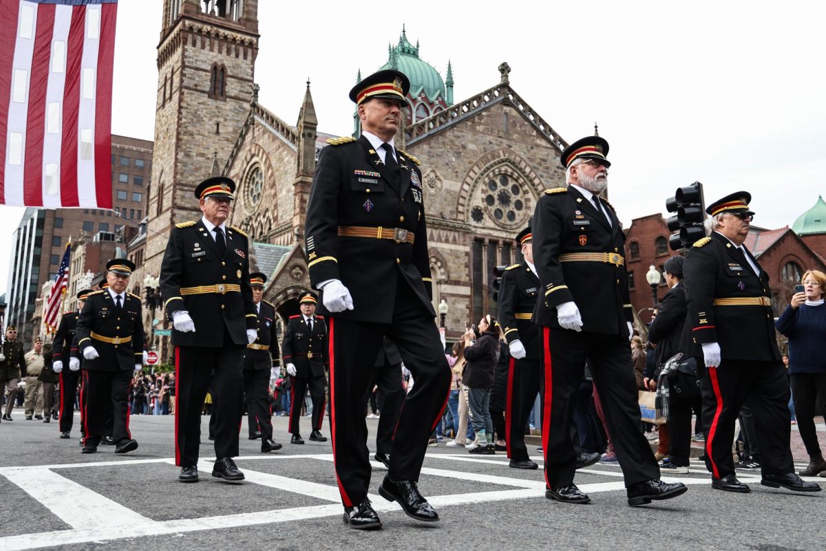 Members of the Ancient and Honorable Artillery Company of Massachusetts march from the Boston Public Library to City Hall Plaza in the parade on Saturday, Nov. 4, 2023. (Ashlyn Wang/Beacon Staff)