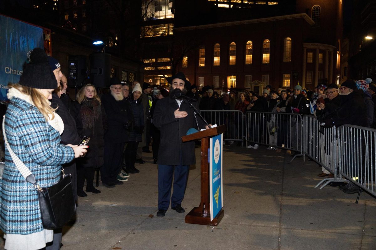 Rabbi Yosef Jazklos addresses the crowd during the annual menorah lighting on Boston Common on Thursday, Dec. 7, 2023. (Madla Walsh/Beacon Staff)