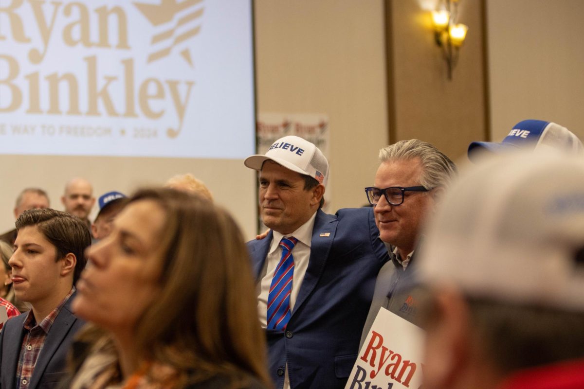 Ryan Binkley (R-TX) speaks with supporters after a campaign rally at the Des Moines Airport Holiday Inn on Sunday, Jan. 14, 2024. (Rian Nelson for the Beacon)