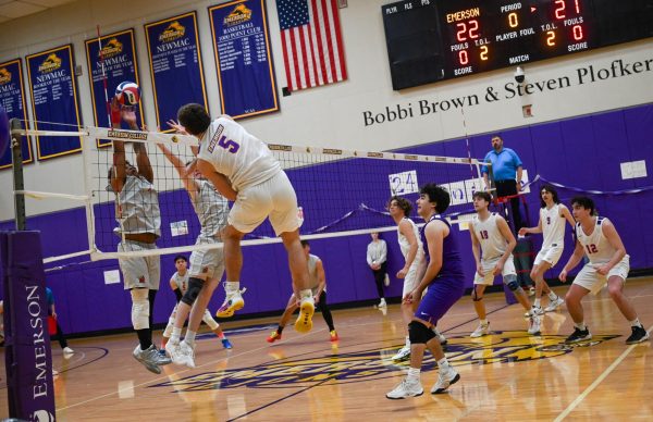 To end the first set with a win, Emerson Lions’ Chase Fagen (5) ups his offense to pass St. Regis in points during the men’s volleyball Senior Day game against St. Regis College at the Bobbi Brown and Steven Plofker gymnasium on Saturday, March 23, 2024. (Mariyam Quaisar/Beacon Staff)
