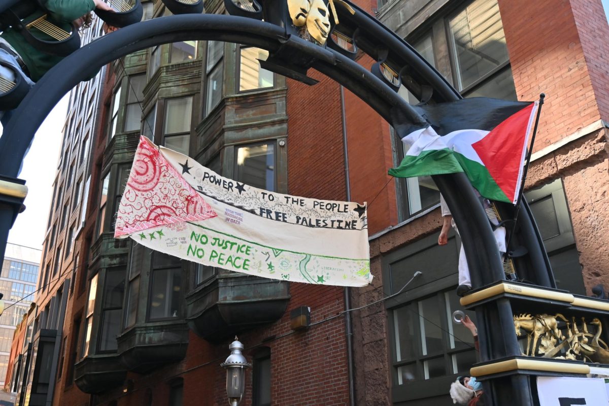A student-painted banner hangs above 2B alley pro-Palestine encampments on Wednesday, April 24, 2024. (Photo courtesy of Nick Peace)
