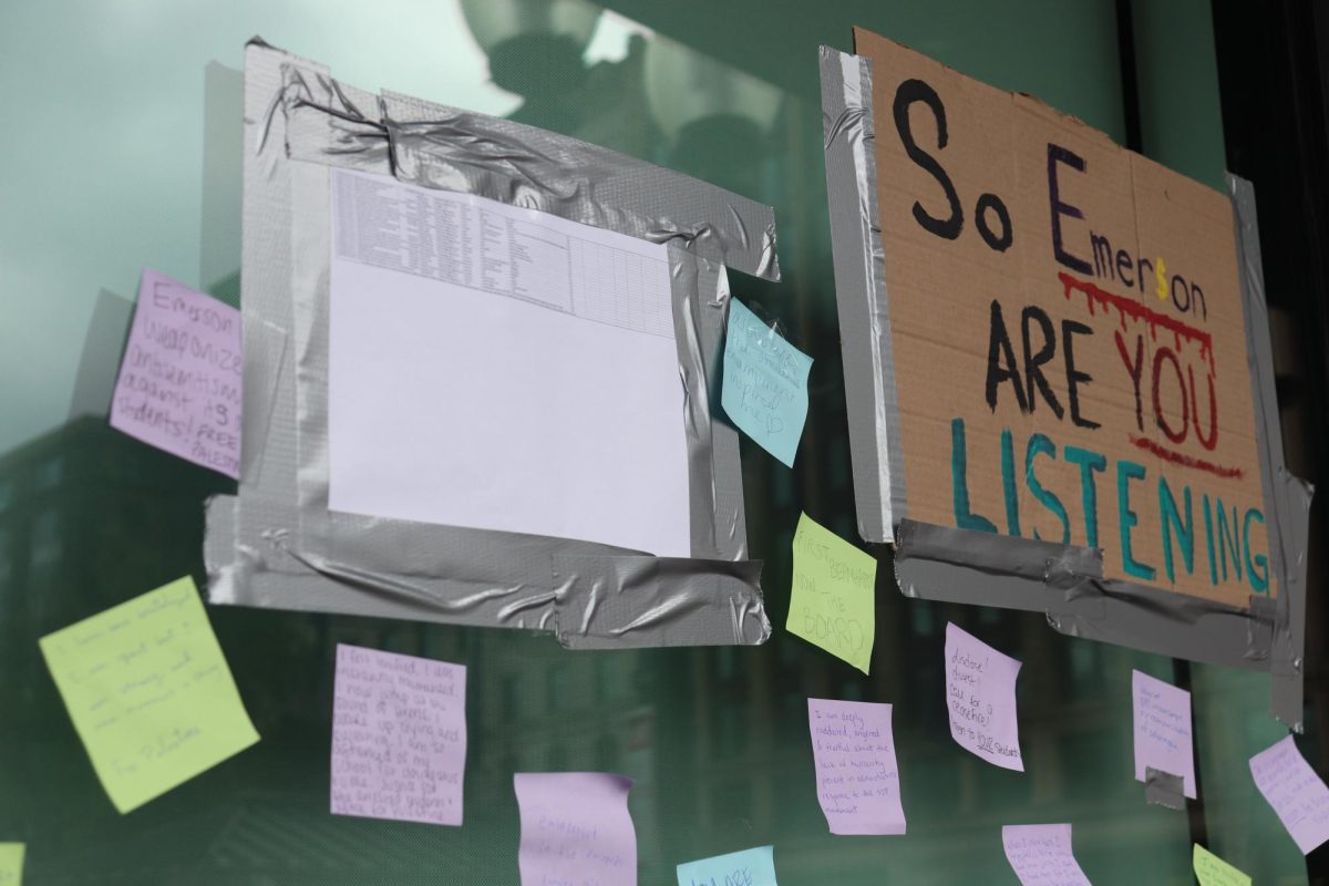 A list of arrested students was duct taped to the windows of Ansin Building (Bryan Hecht/Beacon Staff)