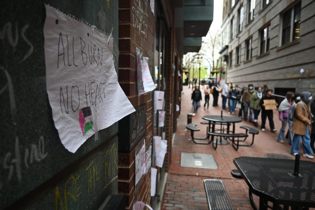 Protesters march into the Boylston Place Alley to chant and protest, on Wednesday, May 1, 2024 (Nick Peace for the Beacon).