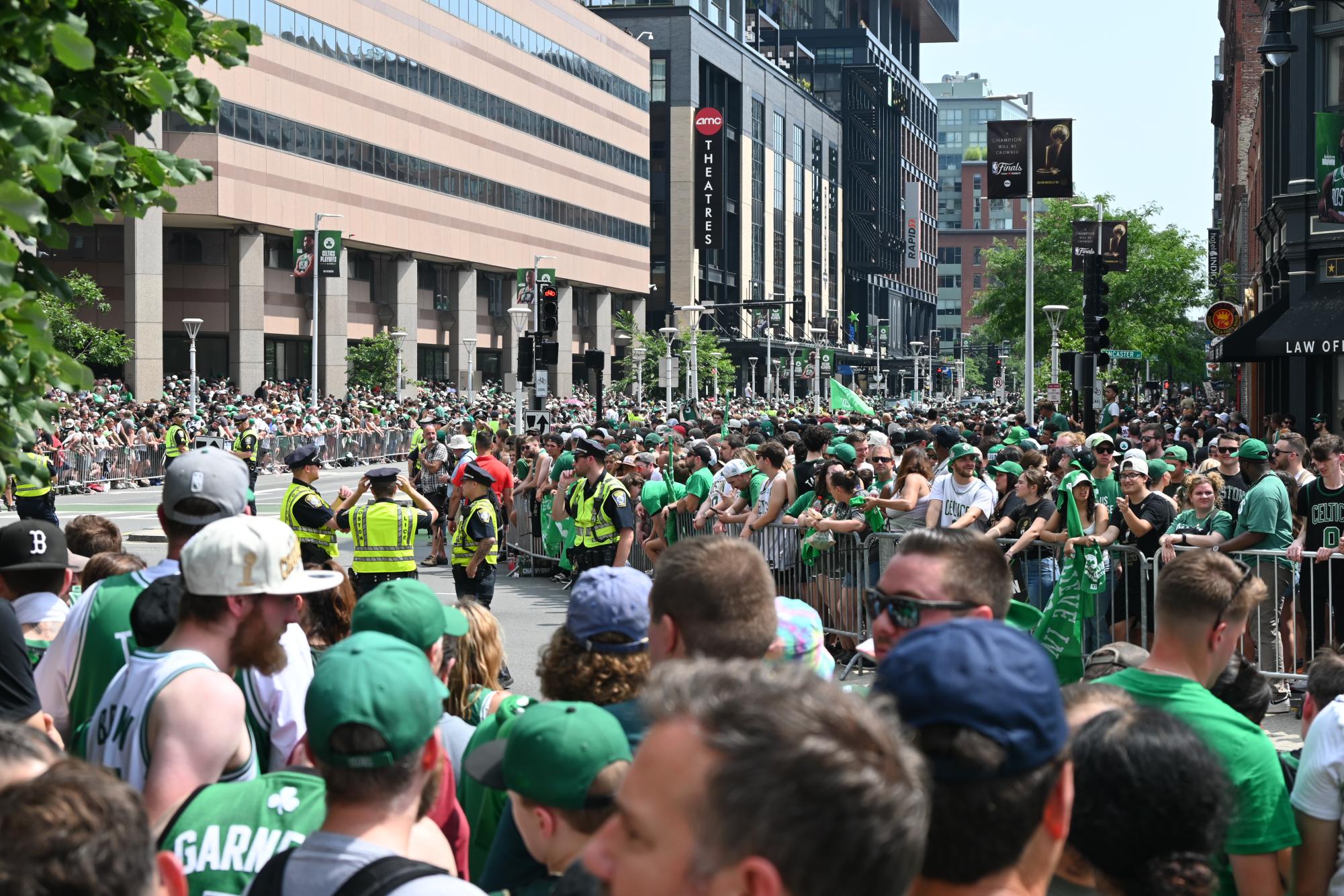 The+Celtics+parade+brought+all+walks+of+life+together+throughout+the+city+of+Boston%2C+with+fans+littering+the+streets+in+green+clothing%2C+confetti%2C+and+signs.+%0D%0A