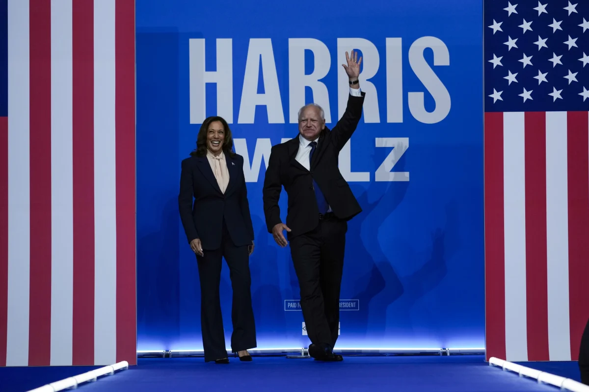 Democratic presidential nominee Vice President Kamala Harris and her running mate Minnesota Gov. Tim Walz arrive at a campaign rally in Philadelphia, Tuesday, Aug. 6, 2024. (AP Photo/Matt Rourke)