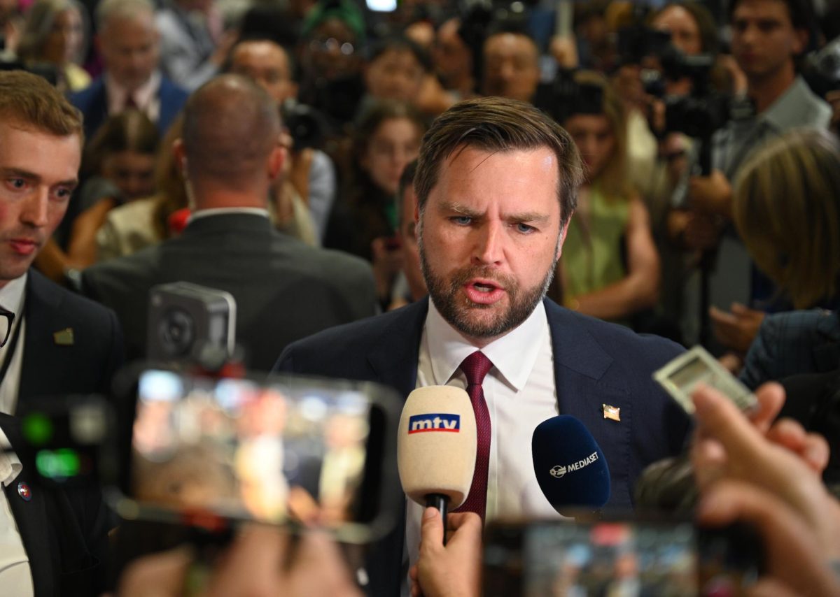 JD Vance, one of the surrogates for the Trump campaign answers questions from journalists in the spin room after the first presidential debate between Trump and Harris on September 10, 2024 (Bryan Hecht / Beacon Staff).