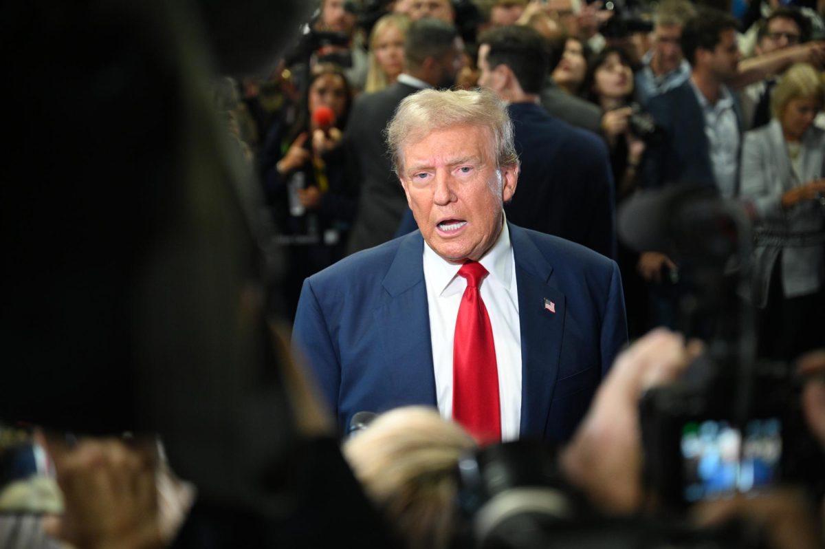 Former President Donald Trump answers questions from journalists in the Philadelphia spin room after his debate with Vice President Kamala Harris at the National Constitution Center on September 10, 2024 (Bryan Hecht / Beacon Staff)