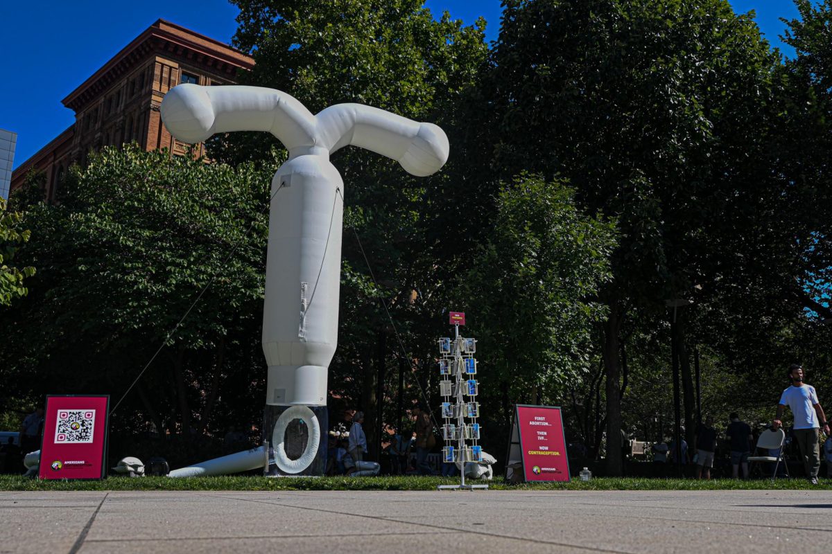 An inflatable IUD from Americans for Contraception outside of the presidential debate in Philadelphia on September 10, 2024 (Nick Peace / For the Beacon).