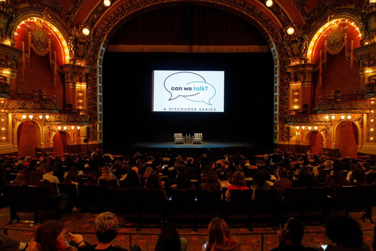 Students and faculty settle into the Cutler Majestic. The Can We Talk? event focused on the interconnectivity of media and social sciences.  (Madla Walsh/ Beacon Staff)