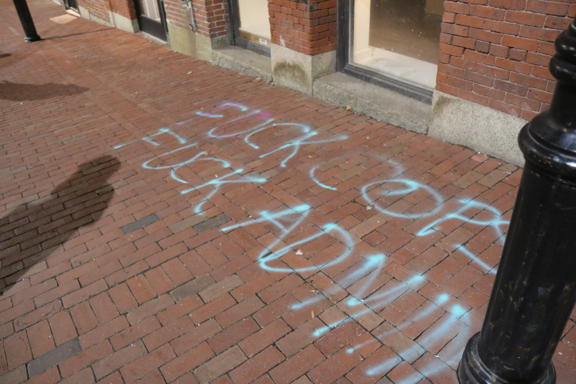 Dozens of pro-Palestinian protesters marched outside of the Israeli Consulate in Boston Tuesday before gathering in the Boylston Place Alleyway.