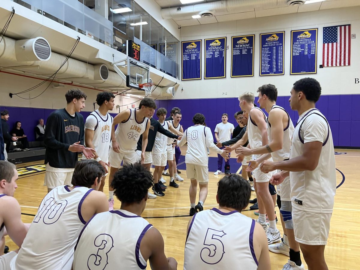 Senior guard Lucas Brenner (#0) is introduced in the starting lineup prior to Tuesday's game against Suffolk (Jordan Pagkalinawan/ Beacon Staff).