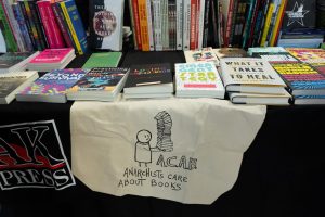 A booth selling books by AK Press, a worker-run publishing and distributing company.