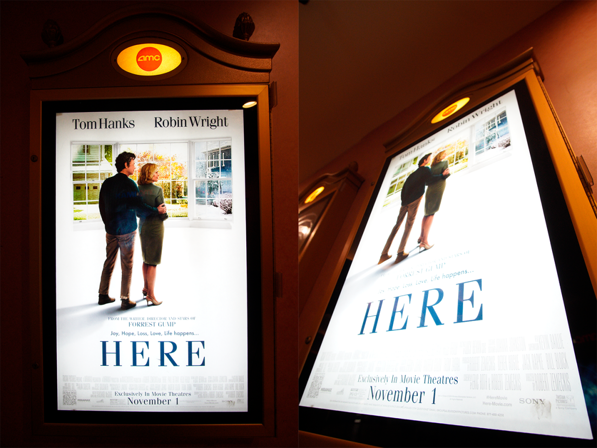 "Here" poster. (Bryan Liu/ Beacon Staff)