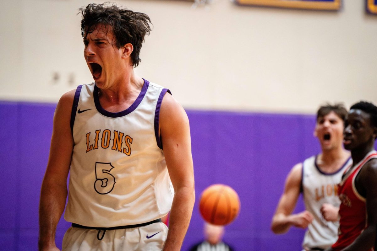 Graduate guard Trevor Arico (#5) reacts after a play against the Bridgewater State Bears on Tuesday, Dec. 10 (Courtesy of Nate Gardner).