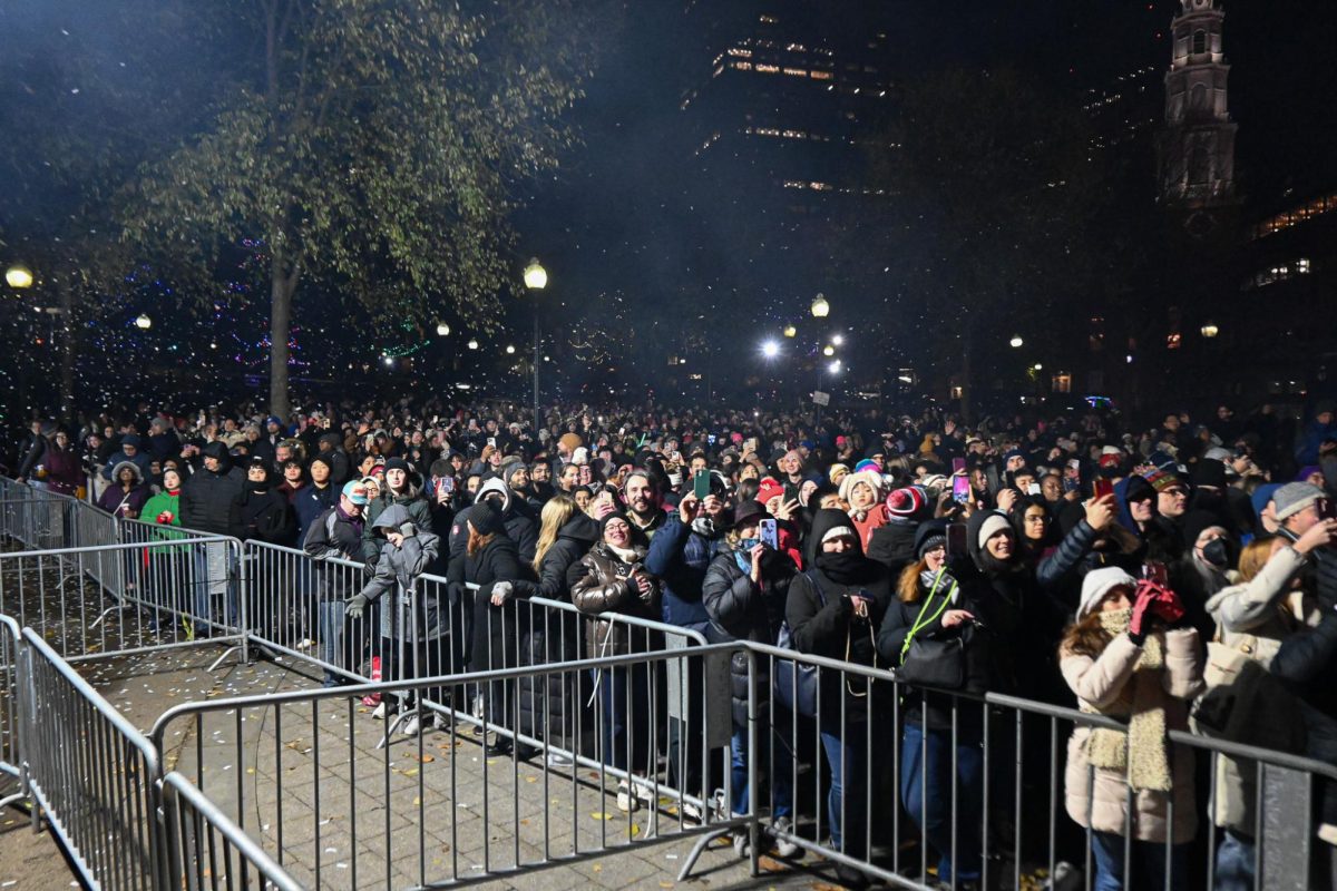 Hundreds of onlookers watch as fireworks are set off during the Holiday Lights celebration in Boston Common on Thursday, Dec. 5, 2024. (Nick Peace/ Beacon Staff).

