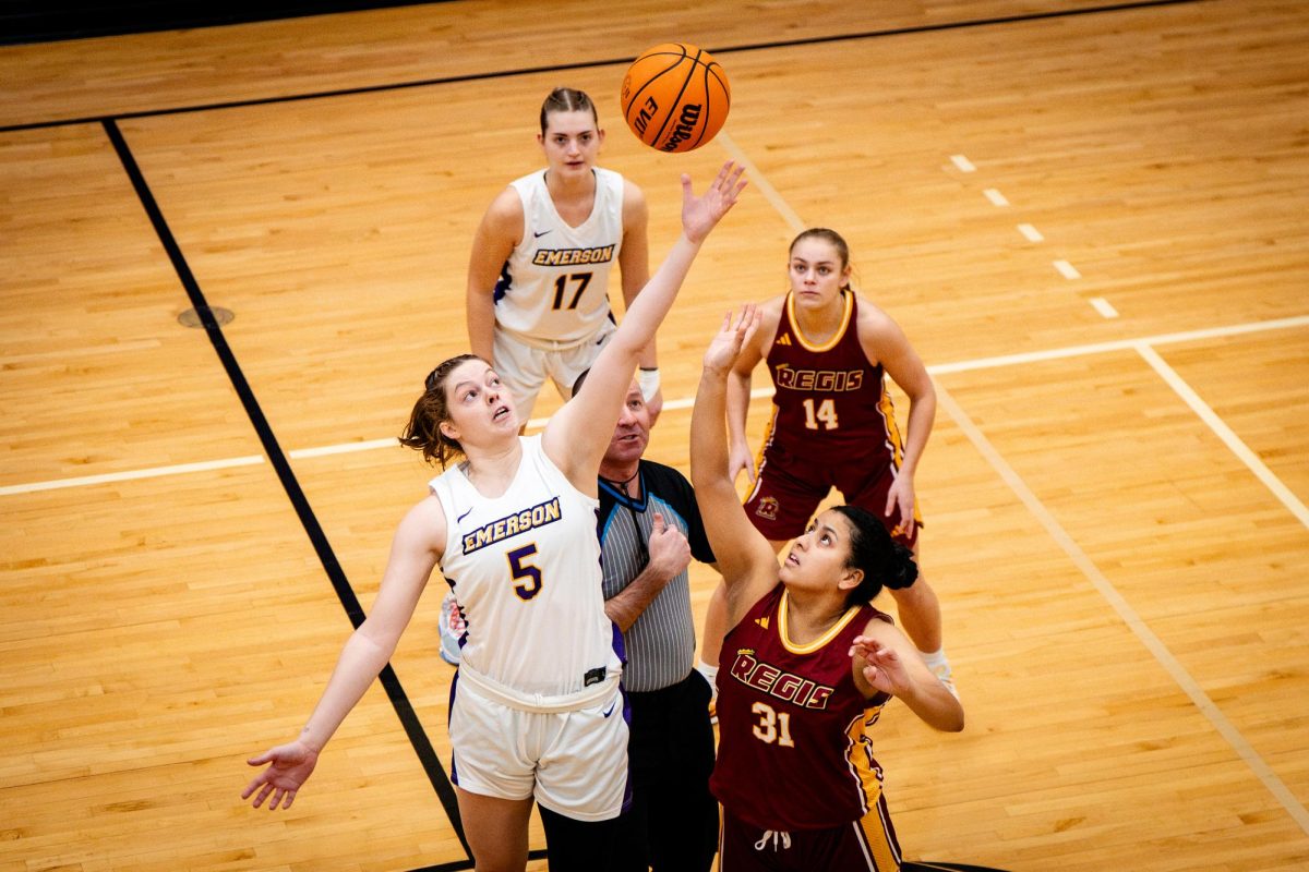 Graduate student forward Charlotte Levison wins the opening tip-off against Regis College on Saturday, Dec. 14 (Courtesy of Nate Gardner)