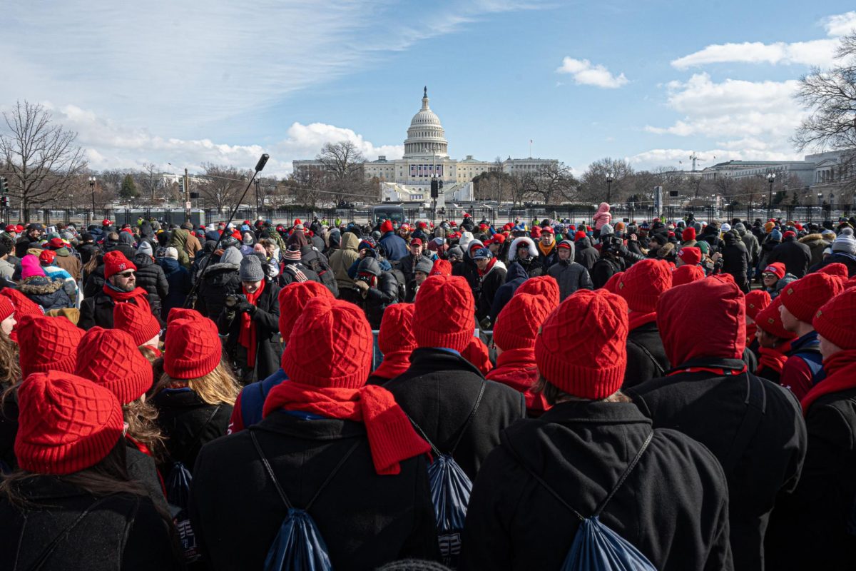 The Delta Youth Chorale group from West Monroe, Louisiana, singing to the crowd of Trump supporters in front of the U.S. Capitol on Monday, Jan. 20, 2025. (Nick Peace/Beacon Staff)