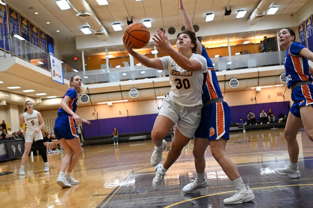 First-year guard Jessie Silk drives for a layup against Coast Guard on Jan. 25, 2025 (Riley Goldman/Beacon Staff).