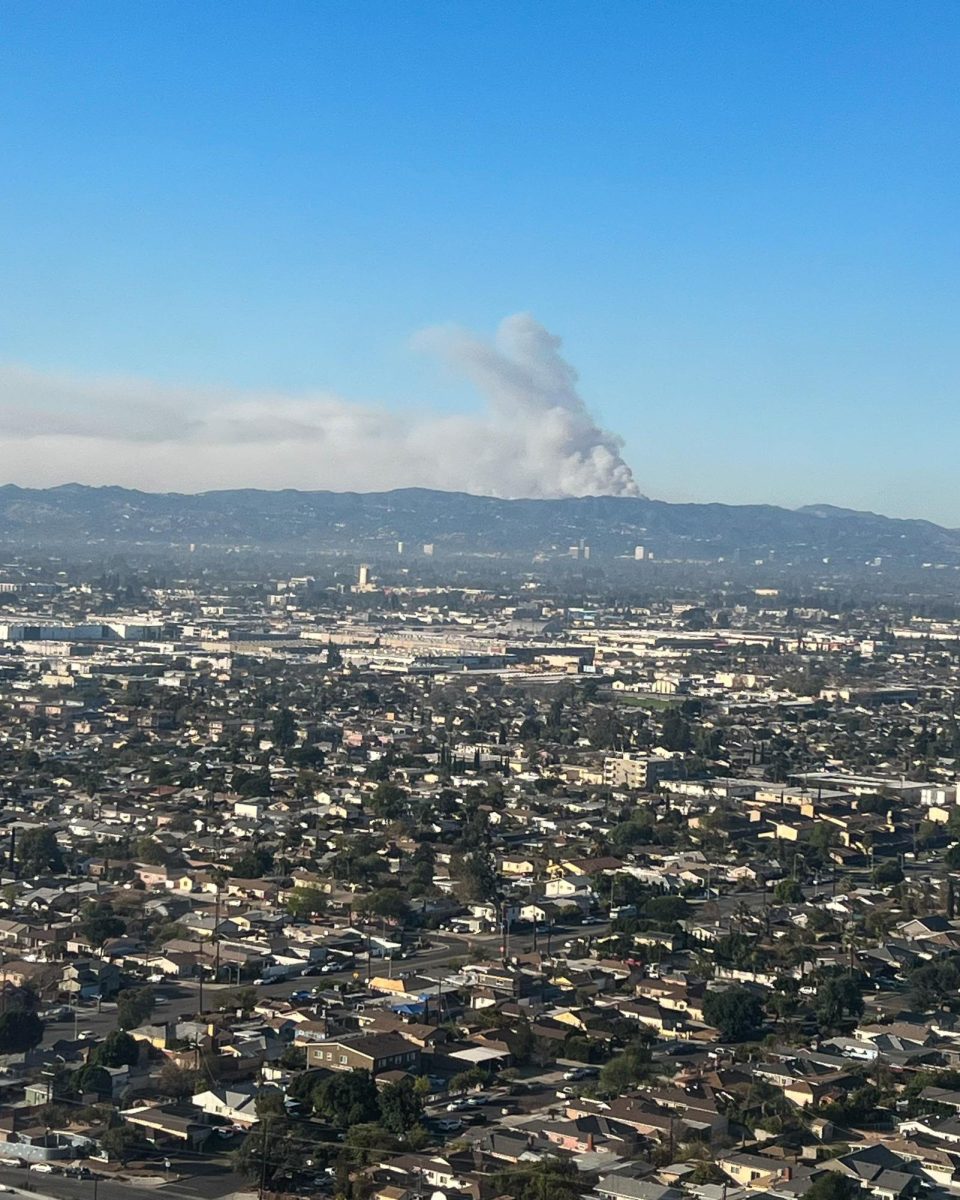 Smoke from the Los Angeles wildfires seen from a flight departing from Hollywood-Burbank Airport on Friday, Jan. 10, 2025. (Jordan Pagkalinawan/ Beacon Staff)